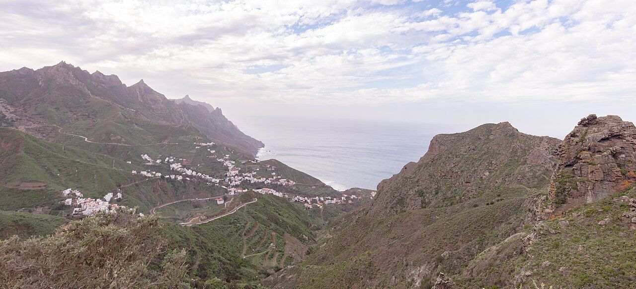 Green mountain ridges of Anaga Rural Park running down to the sea