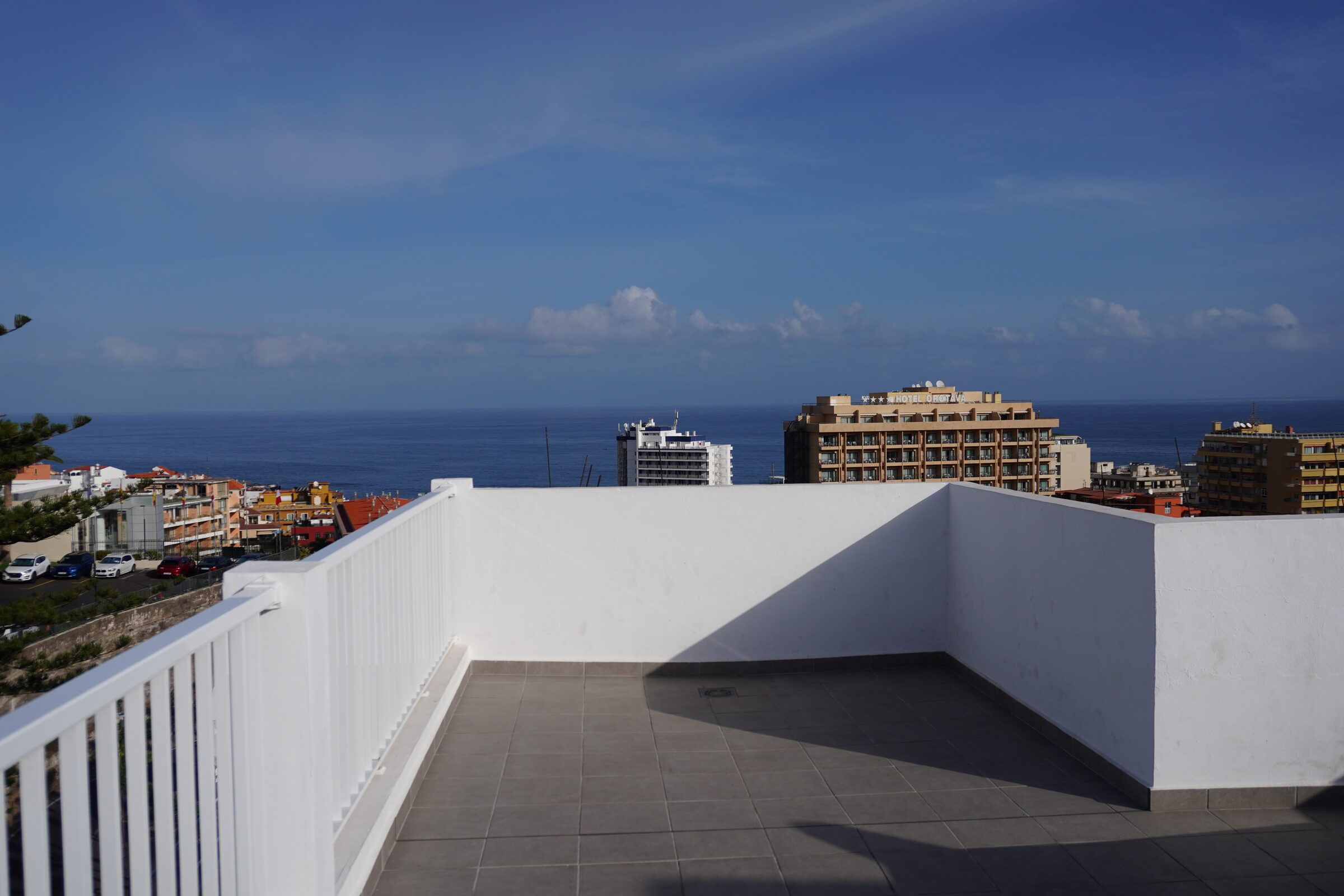 View from the rooftop terrace over the rooftops of Puerto de la Cruz to the Atlantic